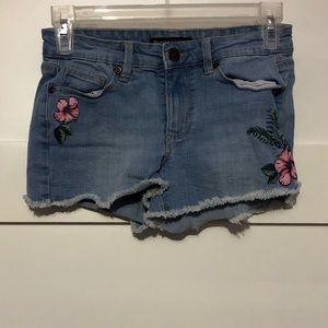 Light wash denim shorts with pink flowers